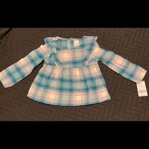 Baby girl’s plaid top